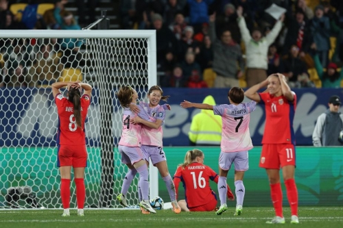 Risa Shimizu of Japan celebrates with teammates after scoring her team's second goal during the match against Norway on August 5, 2023 at Wellington Regional Stadium in Wellington, New Zealand. Japan won 3-1.