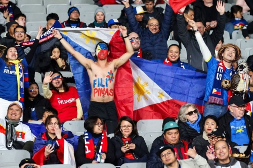Philippines fans cheer for their team before the match against Norway.