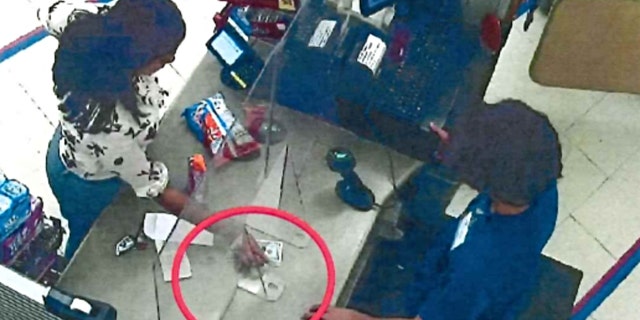 Security camera footage shows Masserone completing a transaction at a Western Union in Walgreens