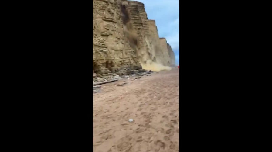 People run for their lives to avoid being crushed under a rockfall