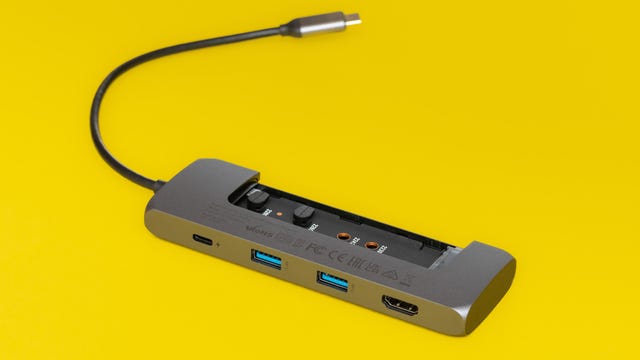 Satechi USB-C Hybrid Multiport Adapter shown with its SSD housing cover removed