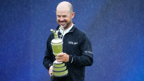 Brian Harman poses with the Claret Jug. 
