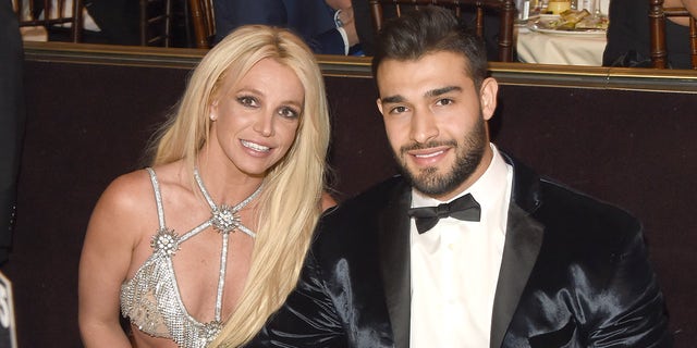 Britney Spears and Sam Asghari smiling together