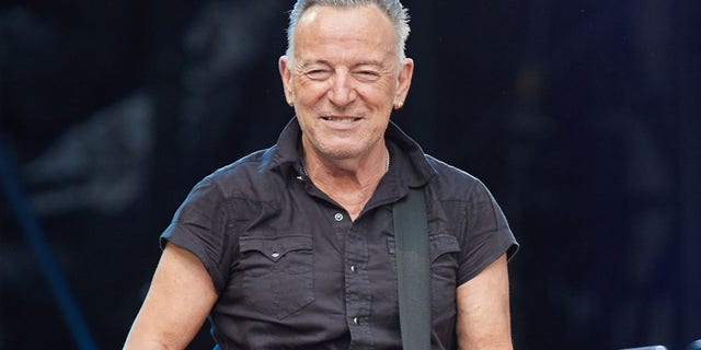 A photo of Bruce Springsteen performing