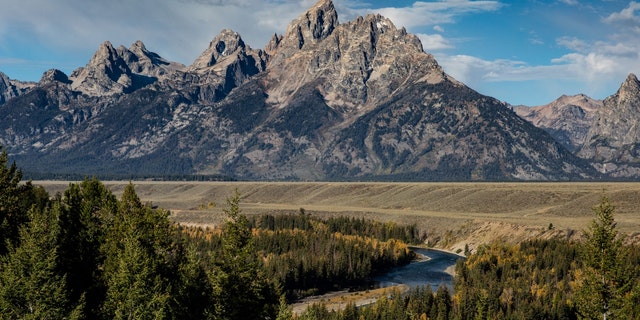 The Grand Teton Mountain Range is viewed from the Snake River Overlook