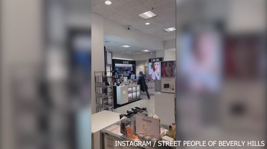 Masked thieves empty shelves At Los Angeles Macy’s, stunned shoppers look on
