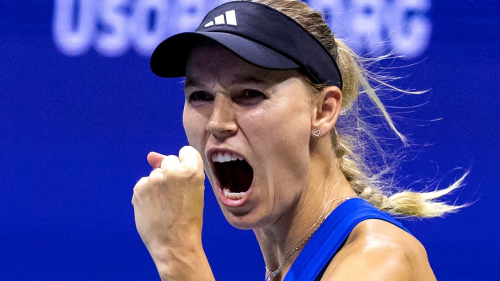 Denmark's Caroline Wozniacki reacts after a point won against Czech Republic's Petra Kvitova during the US Open tennis tournament women's singles second round match at the USTA Billie Jean King National Tennis Center in New York City, on August 30, 2023.