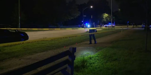 police investigating shooting scene
