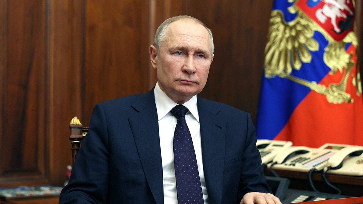Vladimir Putin sitting