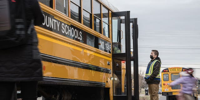 kids outside school bus