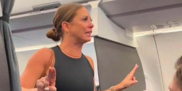 Tiffany Gomas gestures during airplane meltdown