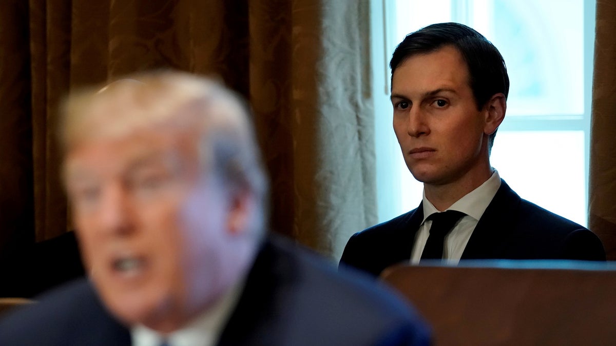 White House Senior adviser Jared Kushner sits behind U.S. President Donald Trump during a cabinet meeting at the White House in Washington, U.S., November 1, 2017. Kevin Lamarque: "The role of Jared Kushner has gone through a series of changes. He began front and centre as a high profile adviser, but as time has passed and issues surrounding him have surfaced, he has become more of a background figure." REUTERS/Kevin Lamarque/File Photo SEARCH "POY TRUMP" FOR THIS STORY. SEARCH "REUTERS POY" FOR ALL BEST OF 2017 PACKAGES. TPX IMAGES OF THE DAY - RC18F2A62480