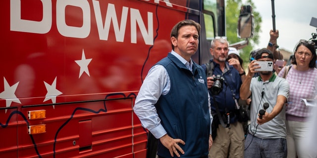 Florida Governor Ron DeSantis speaks to members of the media