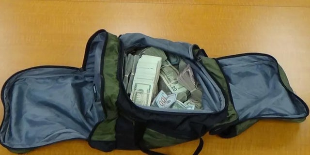 Duffel bag full of cash from drug bust