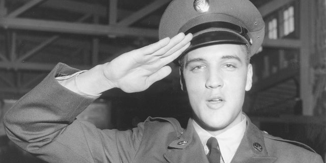 Elvis Presley pictured saluting the Army