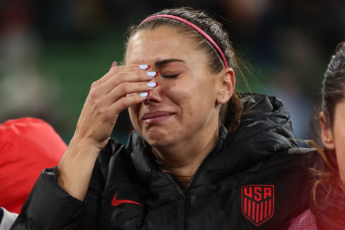 US star Alex Morgan cries after the loss to Sweden.