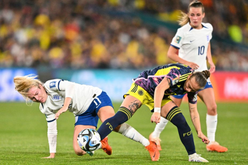 England's Lauren Hemp, left, and Colombia's Ana Guzman fight for the ball.