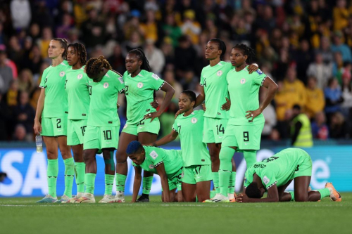 Members of Nigeria's team react during the penalty shootout.