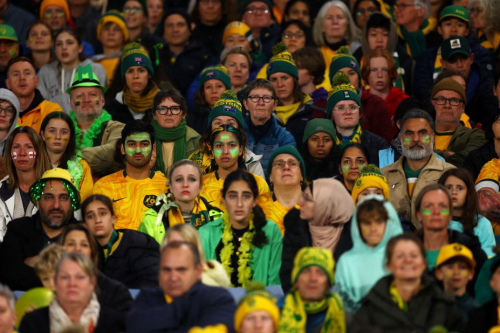 Australia fans react in the stadium as their team falls behind late in the semifinal.