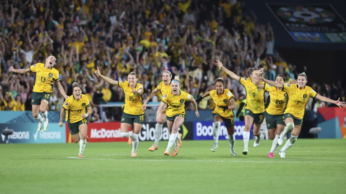 Australia players celebrate after beating France. 