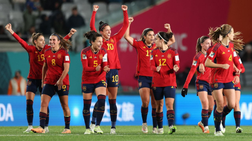 Spain's players celebrate the team's fourth goal against Zambia.