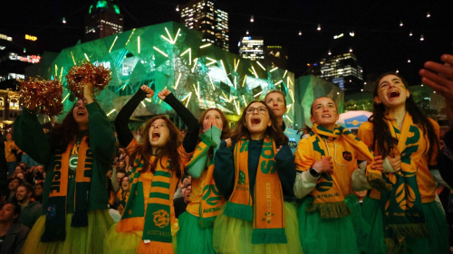 Australia fans watch their team's game against Denmark at a fan zone in Melbourne on August 7.
