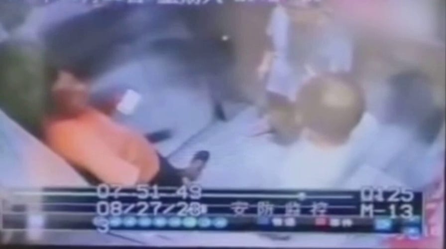 Elevator suddenly takes plunge in China, injuring three people