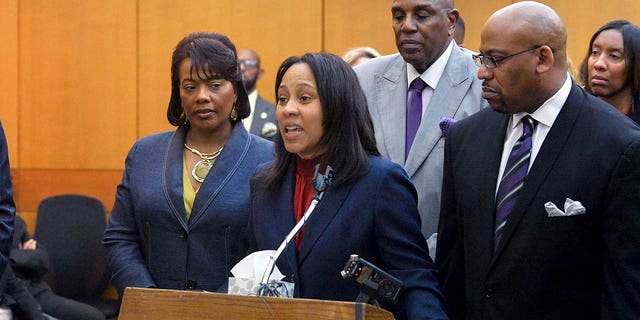 Fulton County Chief Senior Assistant District Attorney Fani Willis speaks during a news conference