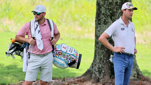 MEMPHIS, TENNESSEE - AUGUST 11: A replacement caddie carries the bag for Harris English of the United States after his caddie had to drop out for the day during the second round of the FedEx St. Jude Championship at TPC Southwind on August 11, 2023 in Memphis, Tennessee. (Photo by Andy Lyons/Getty Images)
