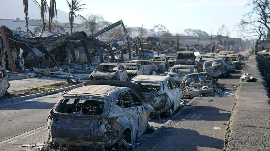 burnt-out cars on street