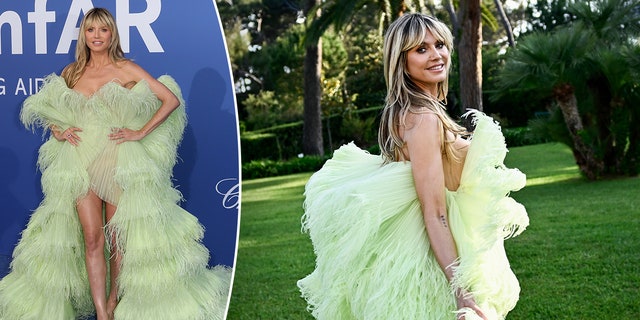 Heidi Klum in a light pastel green dress with lots of tulle on the carpet split Heidi Klum looks back at the camera wearing the same dress walking on grass, both at the amfAR Cannes Gala