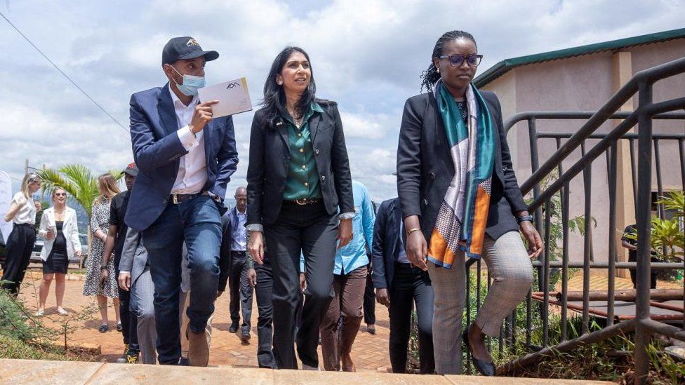 Suella Braverman (centre) pictured on a visit to Rwanda in March 2023