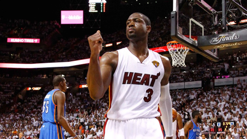 MIAMI, FL - JUNE 17:  Dwyane Wade #3 of the Miami Heat reacts in the first half against the Oklahoma City Thunder in Game Three of the 2012 NBA Finals on June 17, 2012 at American Airlines Arena in Miami, Florida.  NOTE TO USER: User expressly acknowledges and agrees that, by downloading and or using this photograph, User is consenting to the terms and conditions of the Getty Images License Agreement.  (Photo by Mike Ehrmann/Getty Images)