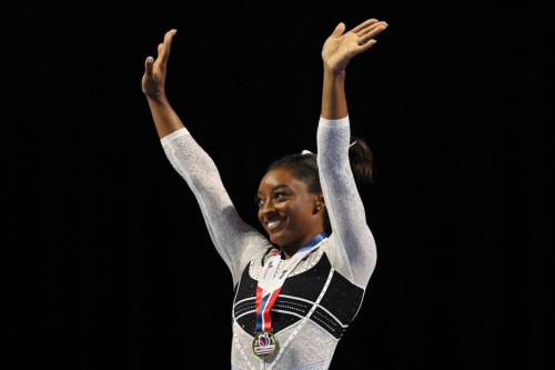 Biles reacts during the awards ceremony after her triumphant return to competition in August 2023.