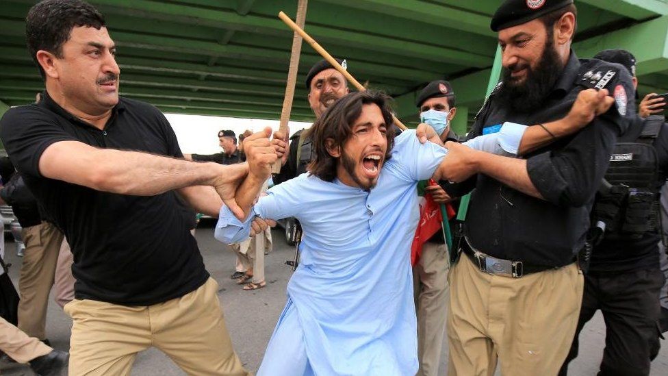 Police detain a supporter of former prime minister and head of opposition party Pakistan Tehreek-e-Insaf (PTI), after he was arrested following court orders that sentenced him to three years in prison in the Toshakhana case, in Peshawar, Pakistan, 05 August 2023