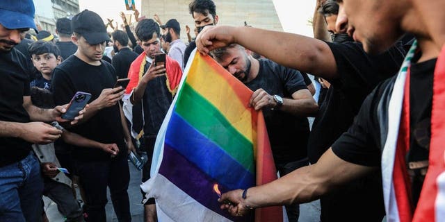 Quran Burning Protest LGBT Rainbow Flag