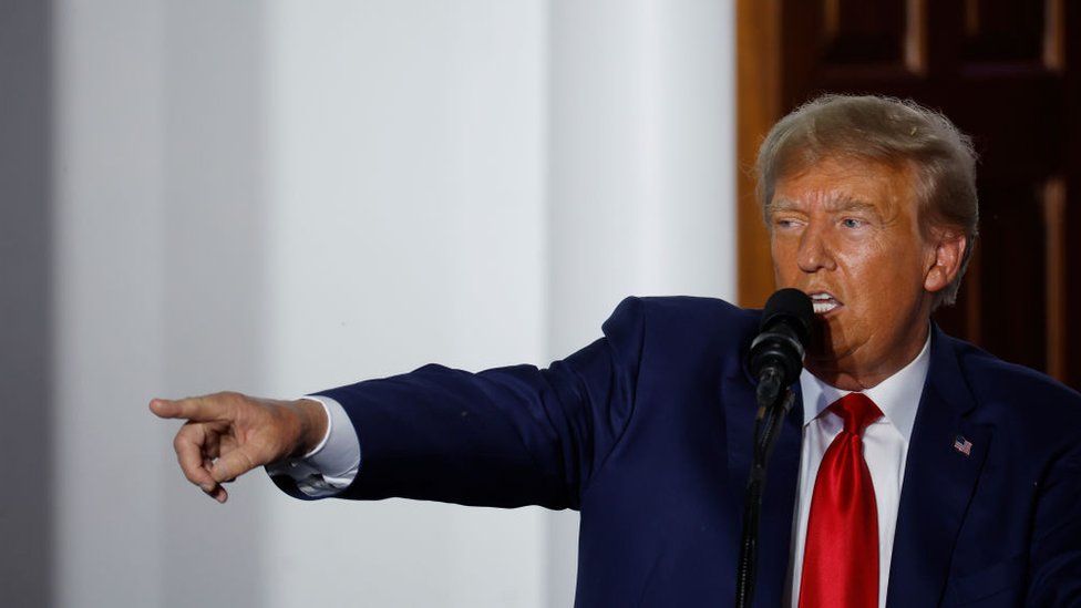 Donald Trump speaks at his Bedminster club in June