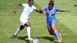 AWolimata Ndiaye of Senegal competes with Milan Pierre-Jerome of Haiti during the 2023 FIFA Women's World Cup Play Off Tournament match between Senegal and Haiti at North Harbour Stadium on February 18, 2023 in Auckland, New Zealand. 