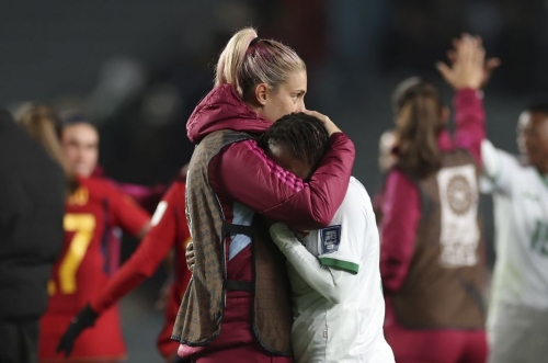 Spain's Alexia Putellas consoles Zambia's Mary Wilombe after the match. Zambia still had one match to play, but it was not going to be able to advance to the knockout stage.