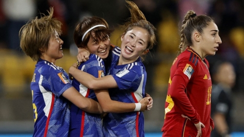 Hinata Miyazawa and her teammates celebrate scoring Japan's third goal against Spain.
