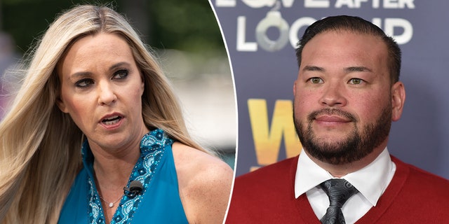 Kate Gosselin in a teal tank top with paisley embroidered looks to her left split Jon Gosselin in a red sweater over a white button down and black tie looks serious