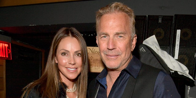 Kevin Costner attends red carpet with wife Christine.