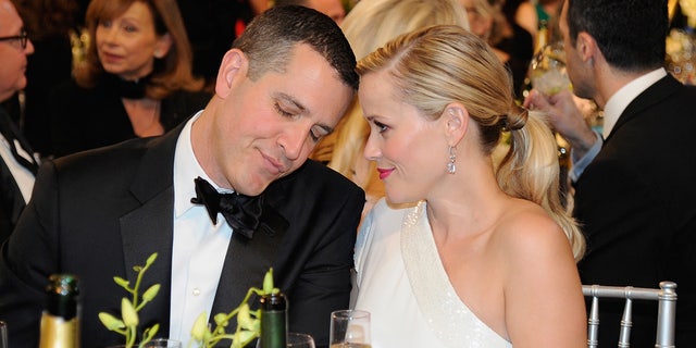 Reese Witherspoon and Jim Toth share a tender moment at SAG Awards