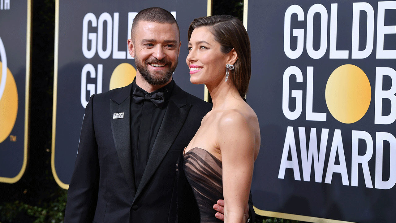 Jessica Biel and Justin Timberlake smiling at the Golden Globe Awards
