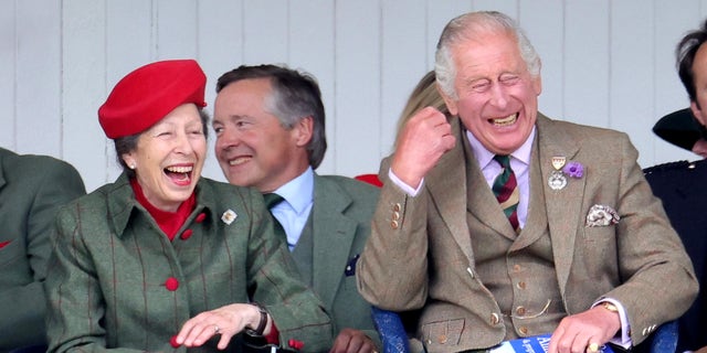 king charles and princess anne sharing a laugh at an event