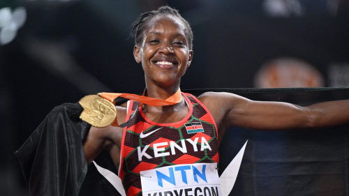 First-placed Kenya's Faith Kipyegon celebrates with her gold medal after winning the women's 1500m final during the World Athletics Championships at the National Athletics Centre in Budapest on August 22, 2023. (Photo by Kirill KUDRYAVTSEV / AFP) (Photo by KIRILL KUDRYAVTSEV/AFP via Getty Images)