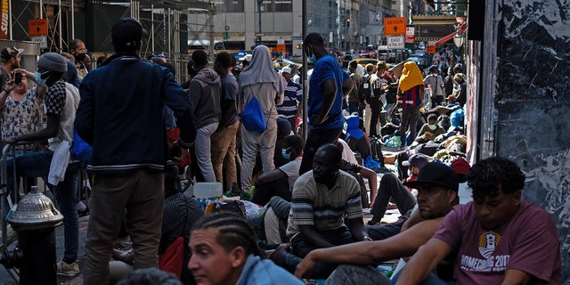 Migrants outside Roosevelt Hotel