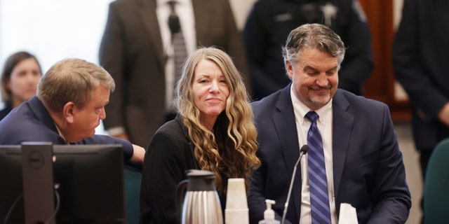 Lori Vallow Daybell talks with her lawyers before the jury's verdict is read at the Ada County Courthouse in Boise, Idaho on Friday May 12, 2023.