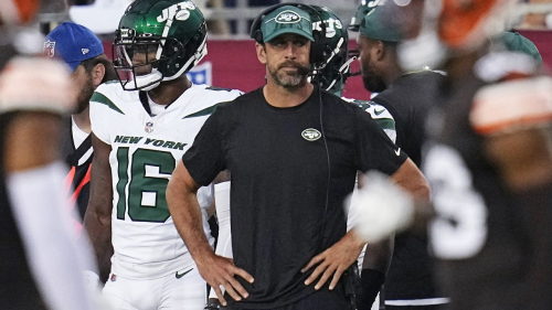New York Jets quarterback Aaron Rodgers, center, stands on the sideline during the first half of the team's Hall of Fame NFL football preseason game against the Cleveland Browns, Thursday, Aug. 3, 2023, in Canton, Ohio. (AP Photo/Sue Ogrocki)