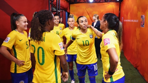 of Brazil is challenged by of Korea during the FIFA Women's World Cup 2015  group E match between Brazil and Korea Republic at Olympic Stadium on June 9, 2015 in Montreal, Canada